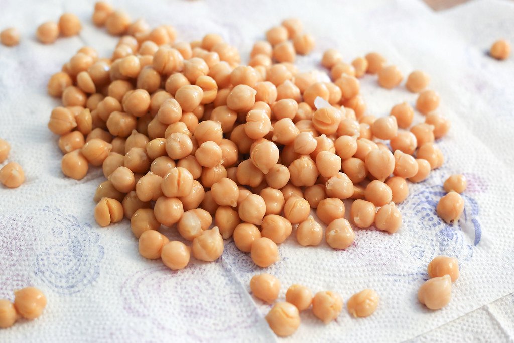 Rinsed chick peas garbanzo beans on a paper towel